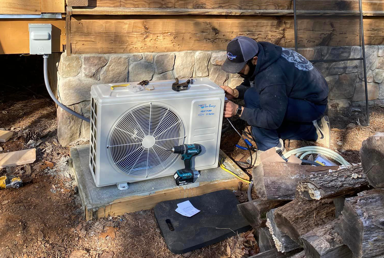 Technician doing an AC Installation 